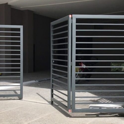 Iron Track Bi-Folding Swing Gate